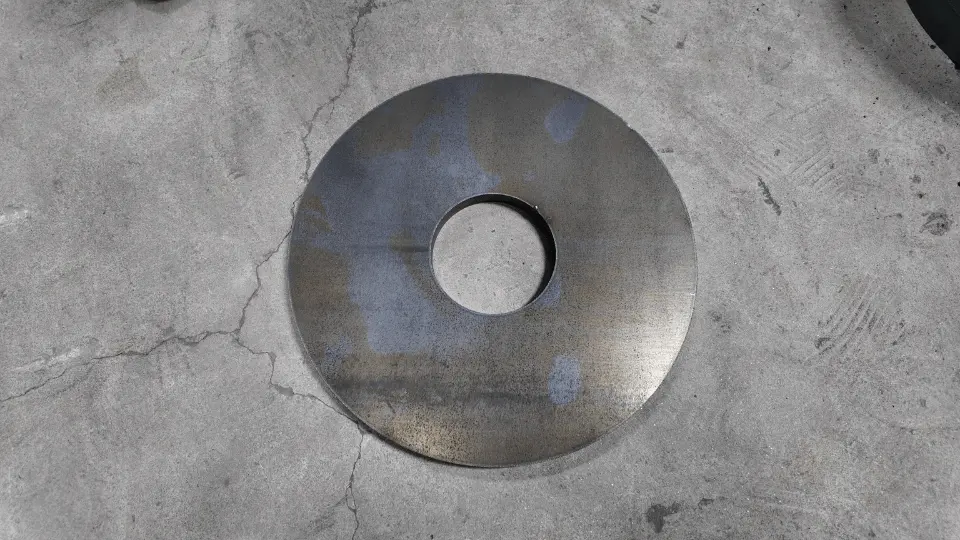 Precision-cut circular steel plate