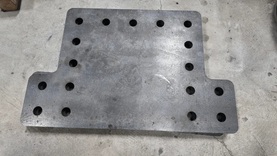 Heavy drilled steel base plate