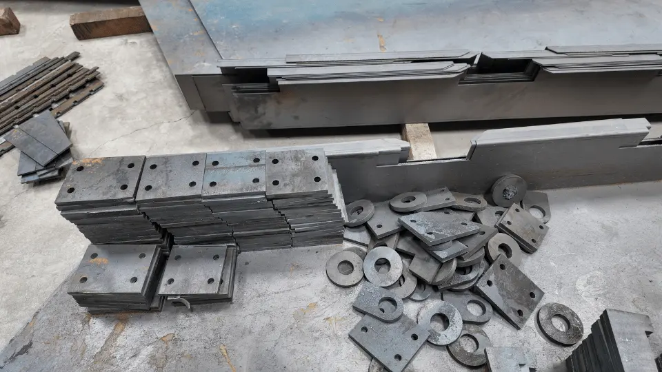 Cut steel plates, washers and brackets